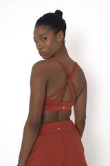 POWERFLOW LIGHT SUPPORT STRAPPY SPORTS BRA BURNT ORANGE