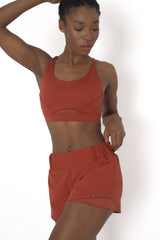 POWERFLOW LIGHT SUPPORT STRAPPY SPORTS BRA BURNT ORANGE