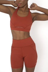 POWERFLOW HIGH-RISE BIKER SHORTS BURNT ORANGE