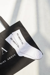 “Rise Above It All” Logo Socks - White