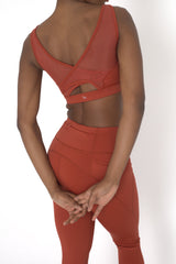 POWERFLOW MEDIUM SUPPORT SPORTS BRA BURNT ORANGE