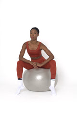 POWERFLOW MEDIUM SUPPORT SPORTS BRA BURNT ORANGE