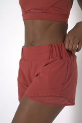 POWERFLOW HIGH-RISE RUNNING SHORTS BURNT ORANGE