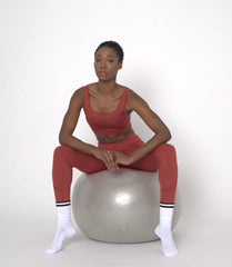 POWERFLOW MEDIUM SUPPORT SPORTS BRA BURNT ORANGE