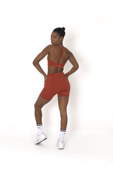 POWERFLOW HIGH-RISE BIKER SHORTS BURNT ORANGE