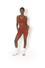 POWERFLOW HIGH-RISE BIKER SHORTS BURNT ORANGE