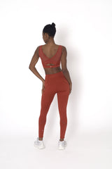 POWERFLOW MEDIUM SUPPORT SPORTS BRA BURNT ORANGE