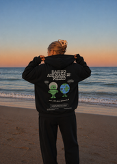 EATING ANIMALS IS WEIRD HOODIE
