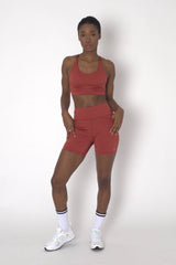 POWERFLOW HIGH-RISE BIKER SHORTS BURNT ORANGE