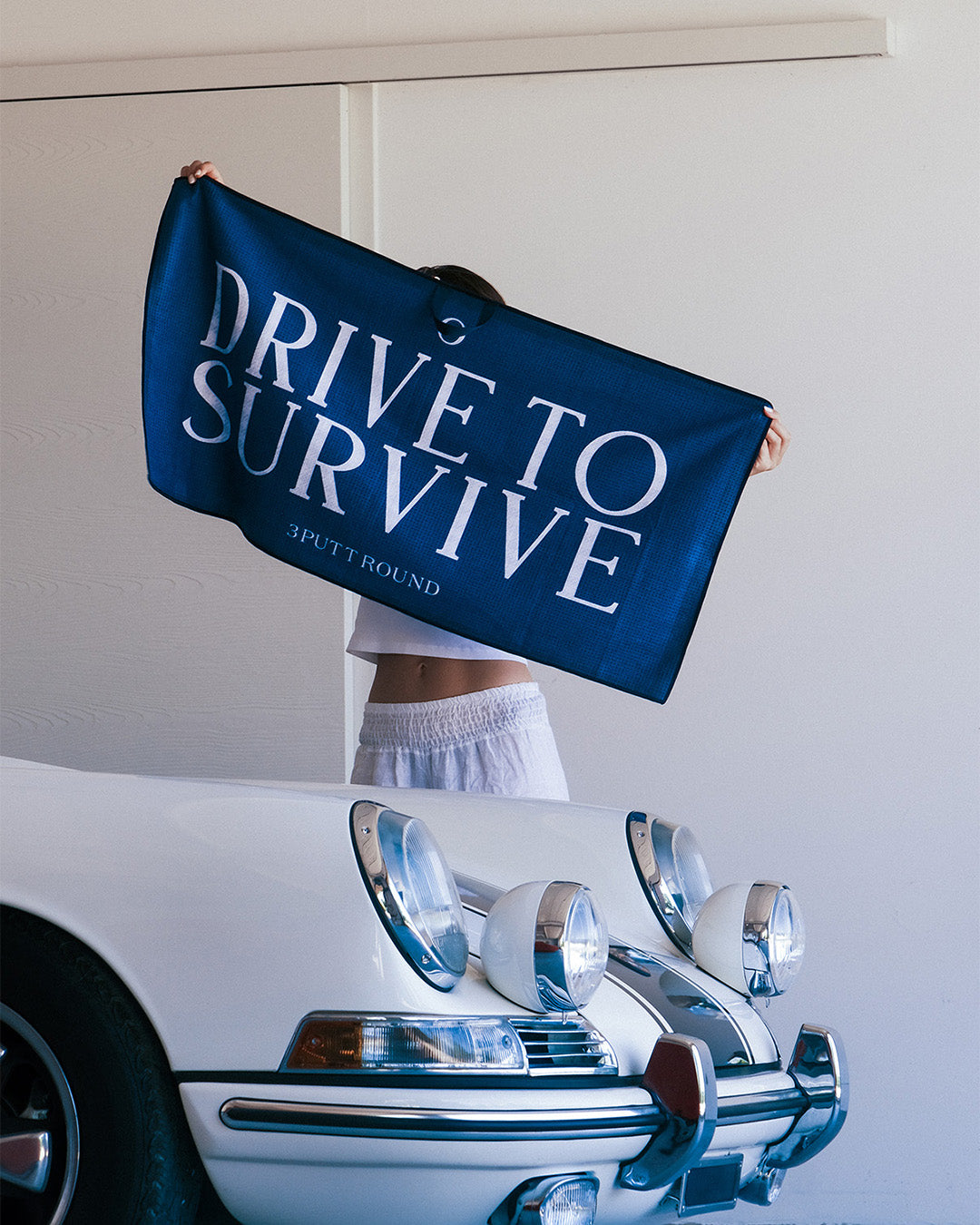 THE “DRIVE to SURVIVE" TOUR TOWEL - 50CM X 100CM