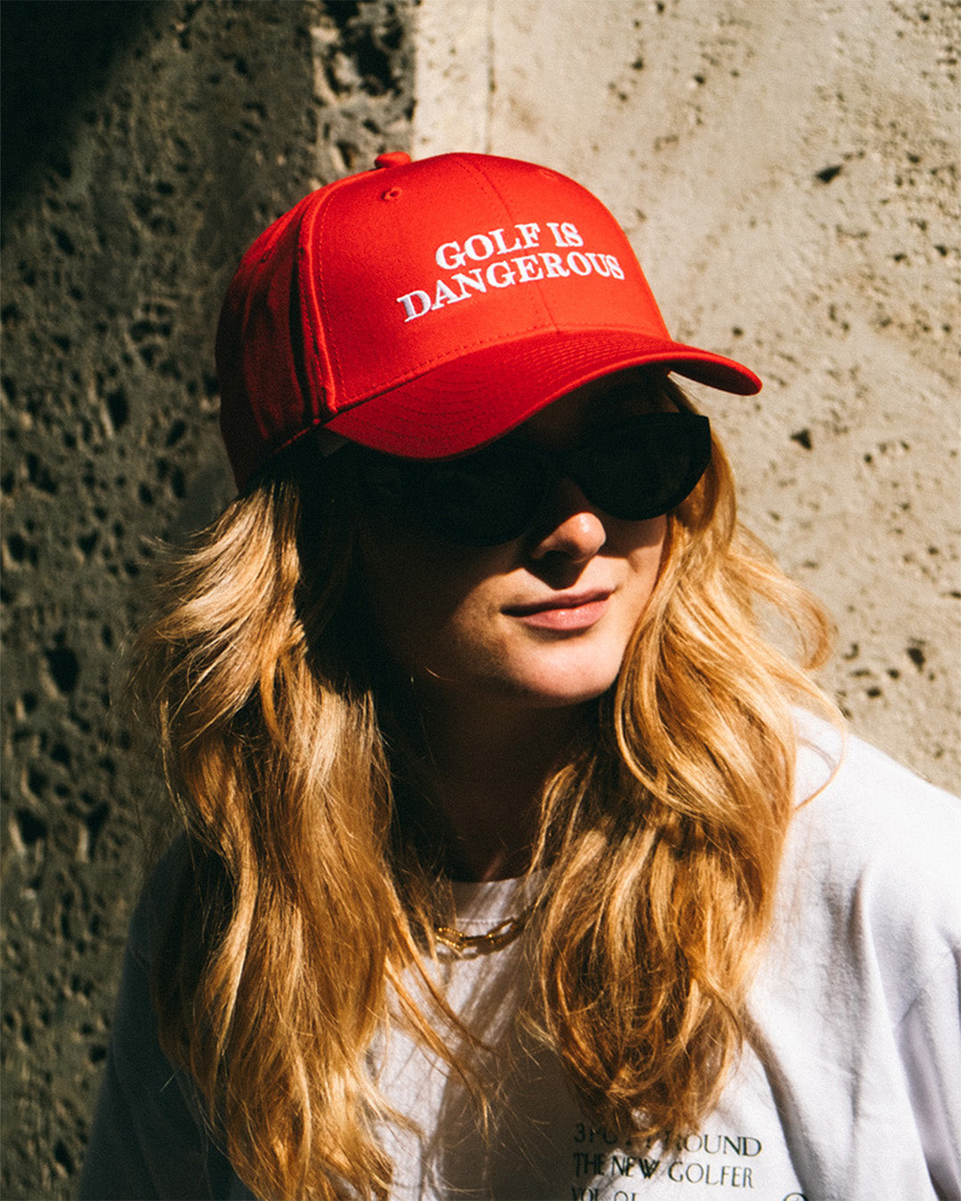 THE "GOLF IS DANGEROUS" BASEBALL CAP