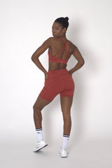 POWERFLOW HIGH-RISE BIKER SHORTS BURNT ORANGE