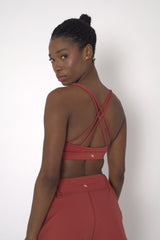 POWERFLOW LIGHT SUPPORT STRAPPY SPORTS BRA BURNT ORANGE